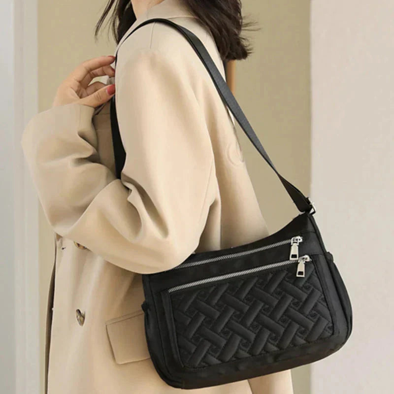 Nielsen™ | Nylon skuldertaske med budbringer