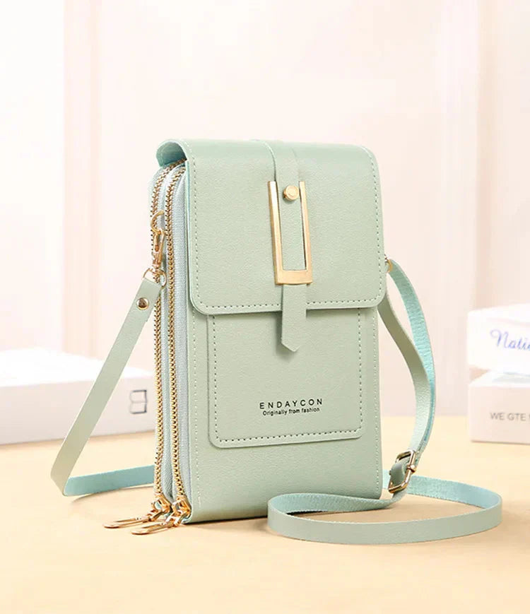 Nielsen™ | Crossbody-tasker med mobiltelefon