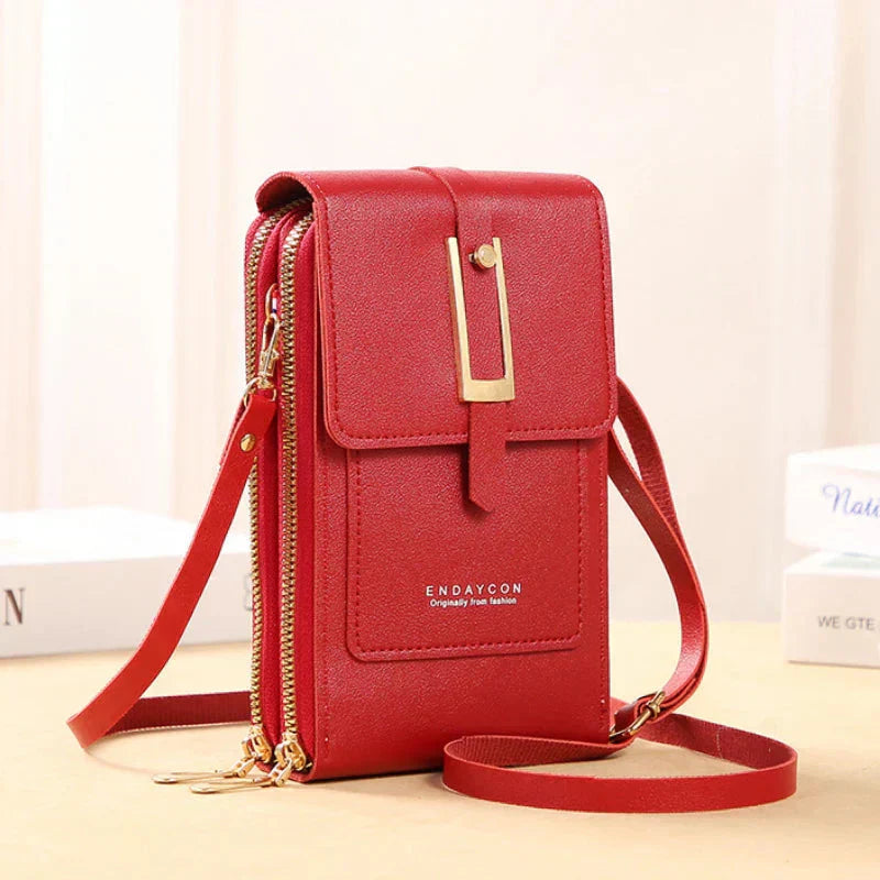 Nielsen™ | Crossbody-tasker med mobiltelefon