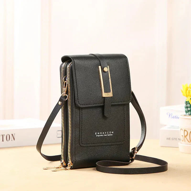 Nielsen™ | Crossbody-tasker med mobiltelefon