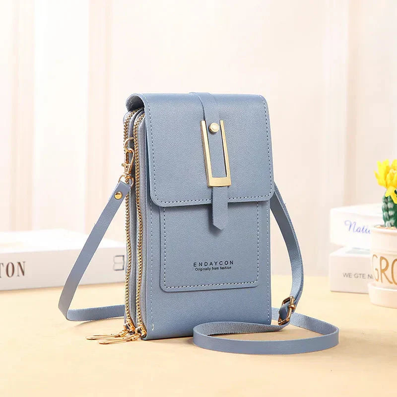 Nielsen™ | Crossbody-tasker med mobiltelefon