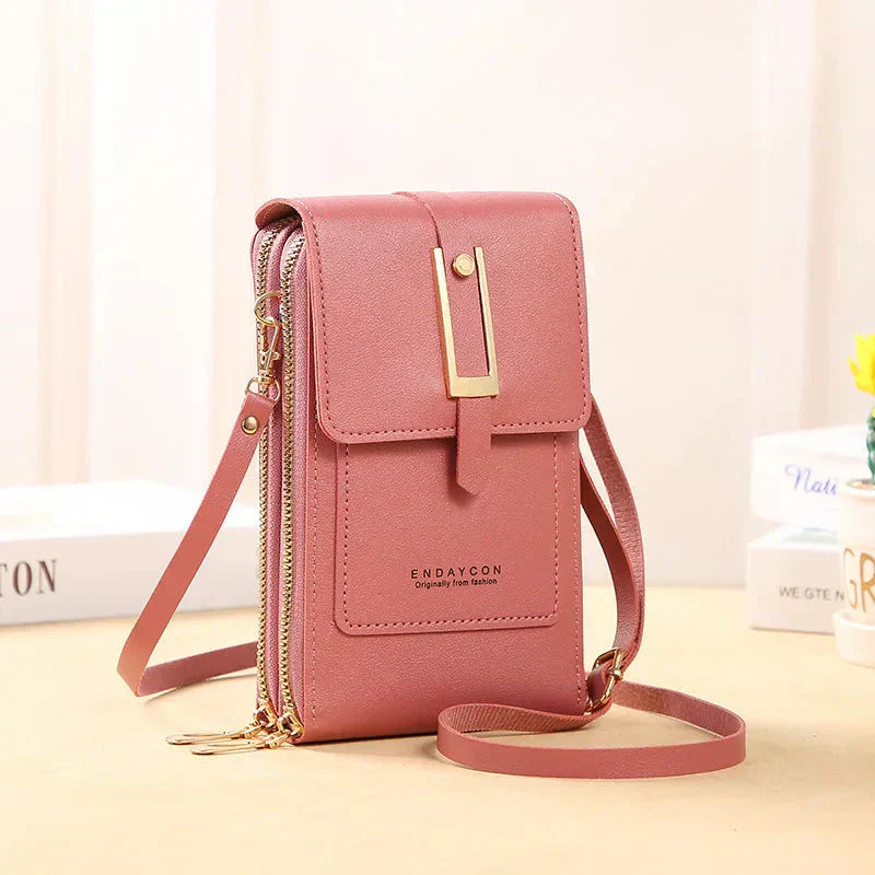 Nielsen™ | Crossbody-tasker med mobiltelefon