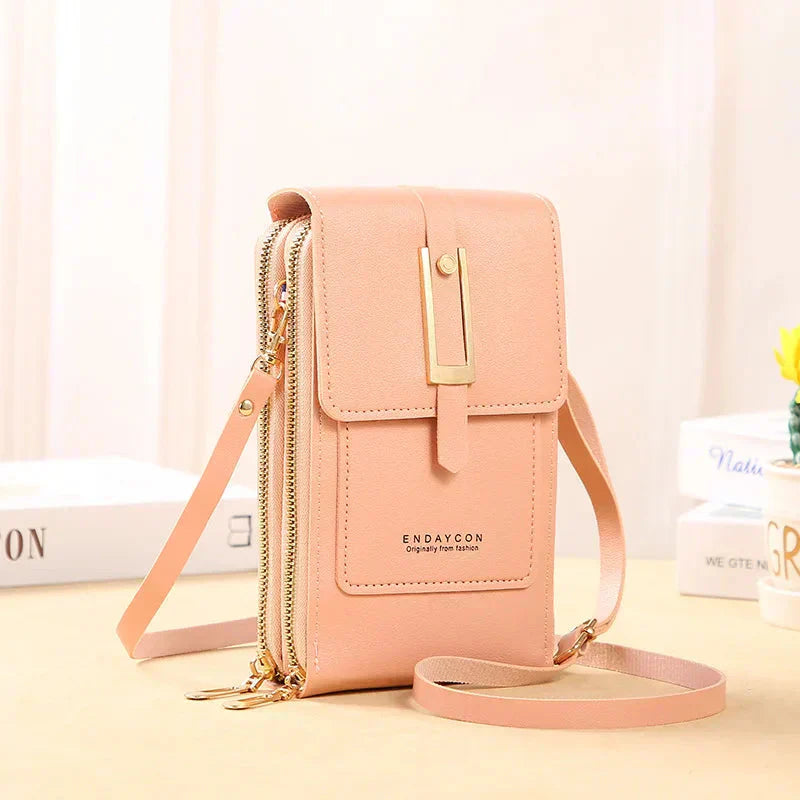 Nielsen™ | Crossbody-tasker med mobiltelefon
